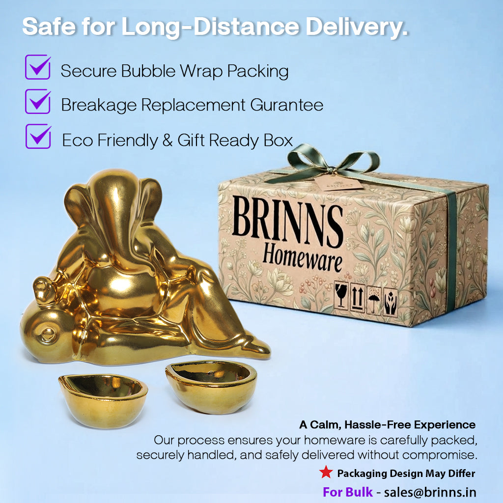 Ceramic Lord Ganesh Idol with Two diyas in Gold Finish